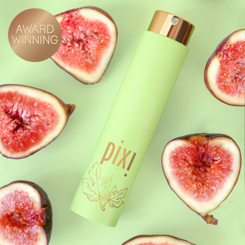 Award Winning: PixiPerfume Fig shown on a green background with figs view 1